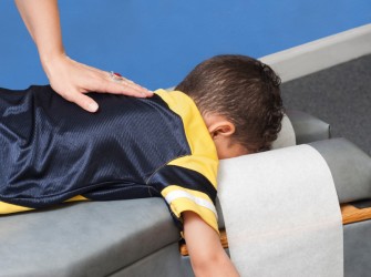 Chiro treating child